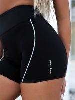 Fekete leggingsből és sportmelltartóból álló kétrészes sport szett